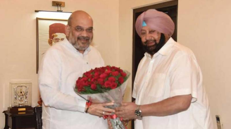 FORMER CM AMRINDER SINGH METS HOME MINISTER  AMIT SHAH IN DELHI