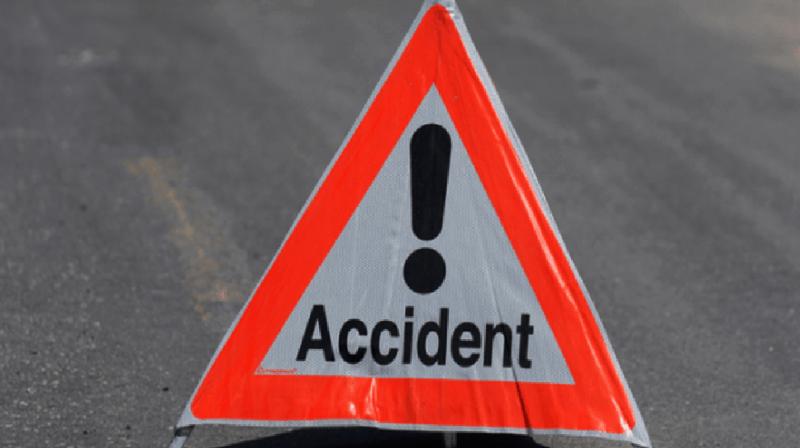 Man, son killed as dumper overturns