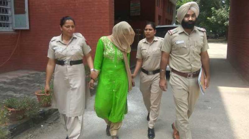 Poonam in the custody of Sub-Inspector Gurjiwan Singh Poonam in the custody of Sub-Inspector Gurjiwan Singh