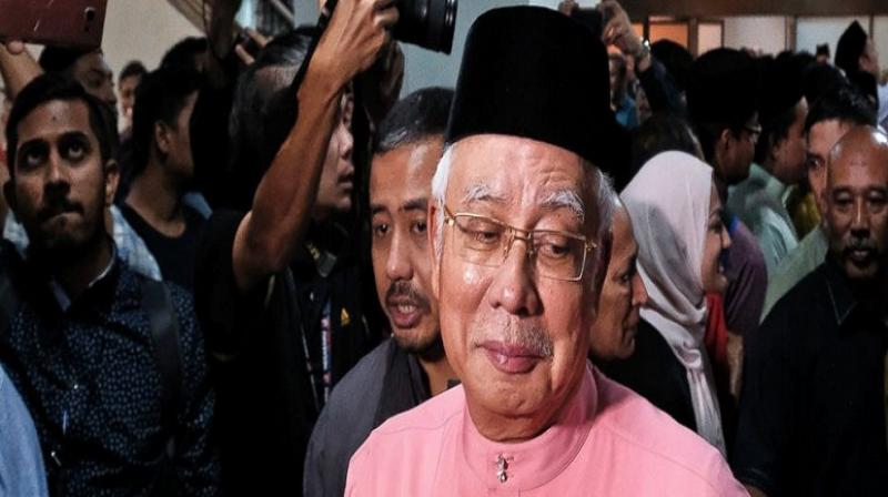 Defeated Malaysian leader Najib Razak resigns from his party Defeated Malaysian leader Najib Razak resigns from his party