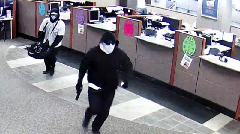 Bank cashier robbed 