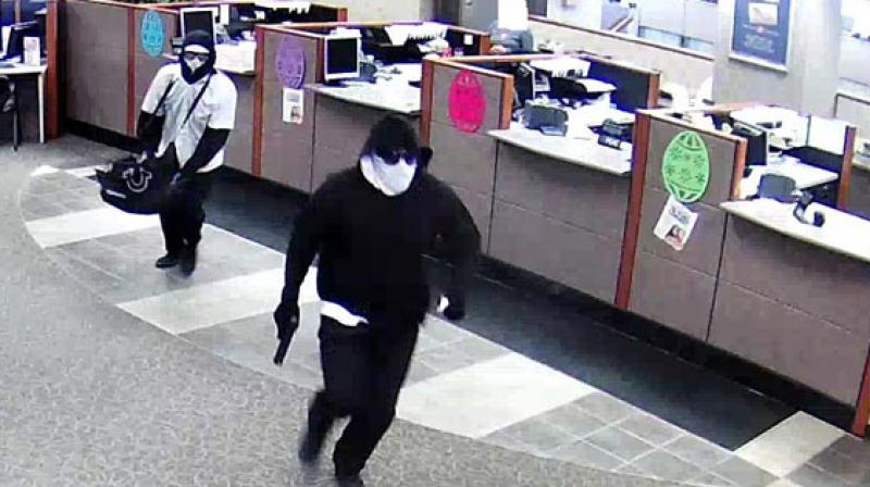 Bank cashier robbed Bank cashier robbed