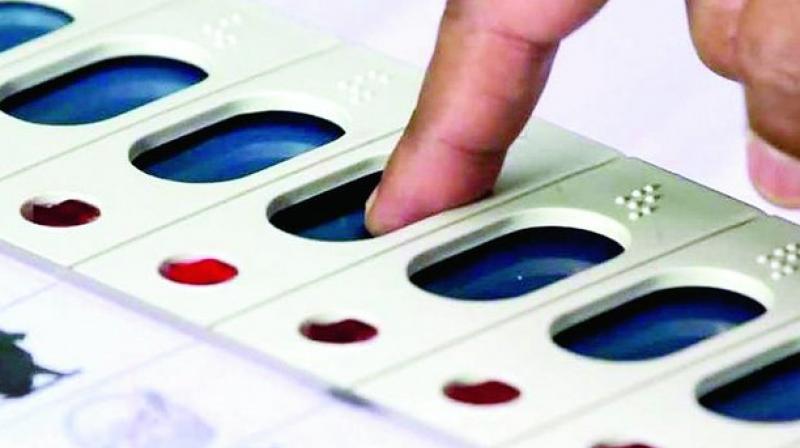 Persons had posted photos of casting vote on EVMs