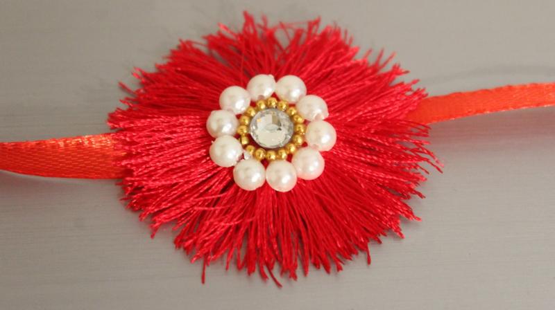 Rakhis made of waste silk threads Rakhis made of waste silk threads