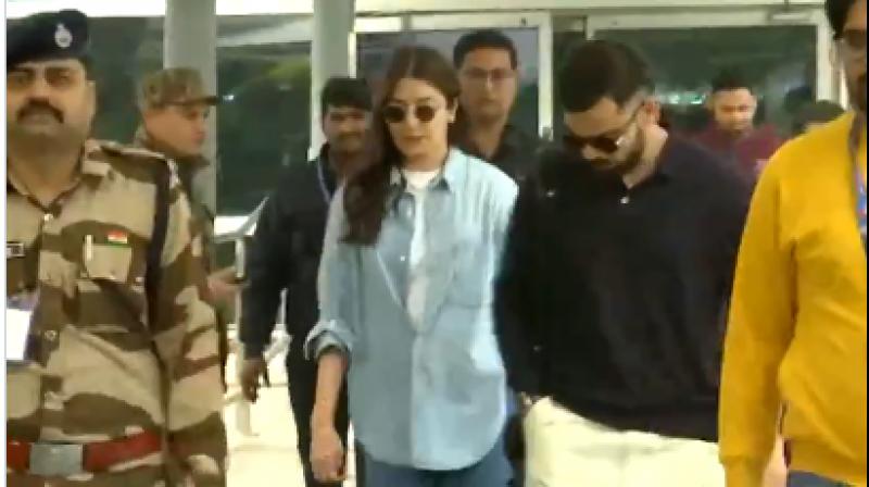 Virat Kohli and Anushka Sharma Arrive at Delhi Airport