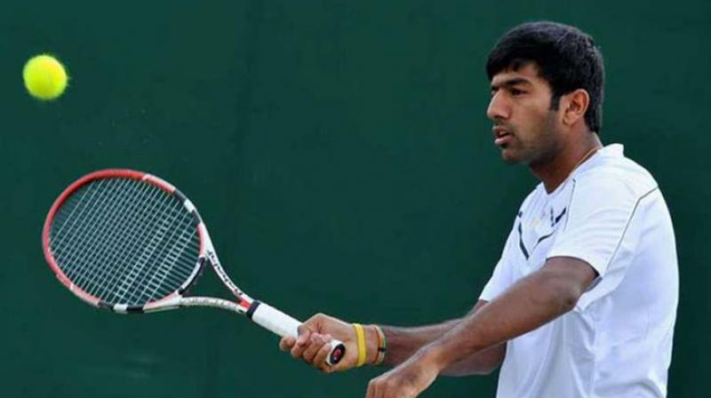 Bopanna and partner crash out of Wimbledon Bopanna and partner crash out of Wimbledon