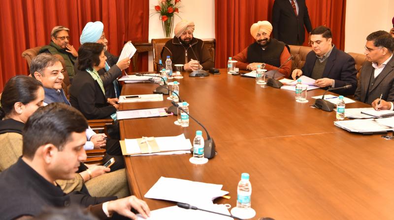 Captain Amarinder Singh on Tuesday announced a high-powered committee Captain Amarinder Singh on Tuesday announced a high-powered committee