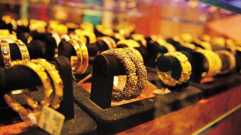 Gold prices dived by Rs 430 Gold prices dived by Rs 430
