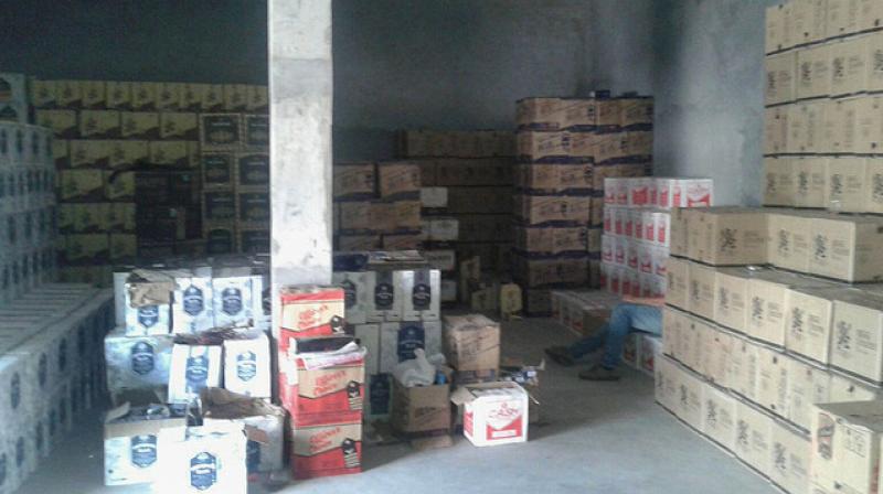 4 arrested, 740 cartons of illicit liquor seized
