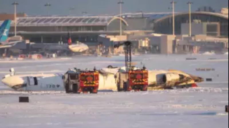 Delta plane flips during landing at Toronto airport; all 80 onboard escape alive Delta plane flips during landing at Toronto airport; all 80 onboard escape alive