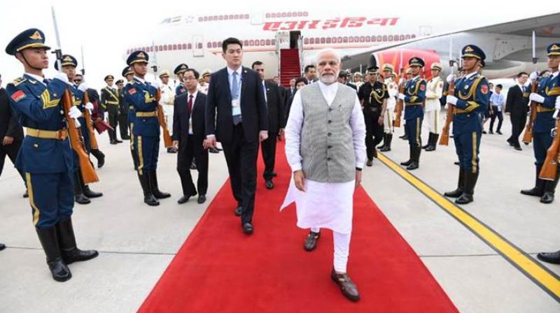 Prime Minister Narendra Modi arrived in Qingdao in China on Saturday Prime Minister Narendra Modi arrived in Qingdao in China on Saturday
