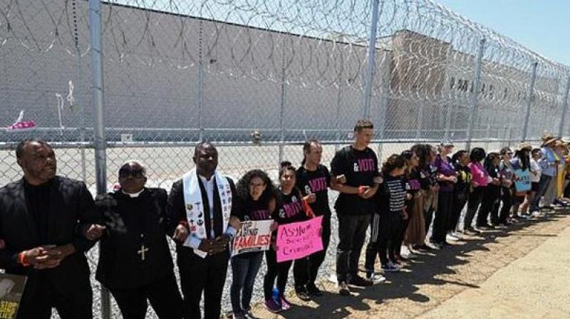 'We want the children inside migrant detention centre 'We want the children inside migrant detention centre