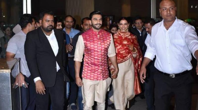 Newlyweds Deepika-Ranveer arrive in India