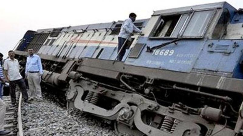 The engine of a passenger train derailed The engine of a passenger train derailed