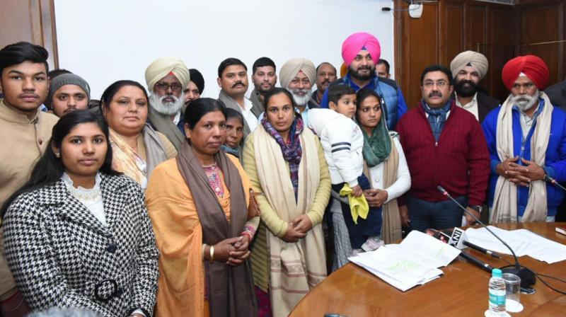 Punjab Government to always stand by their families through thick & thin: Navjot Singh Sidhu Punjab Government to always stand by their families through thick & thin: Navjot Singh Sidhu