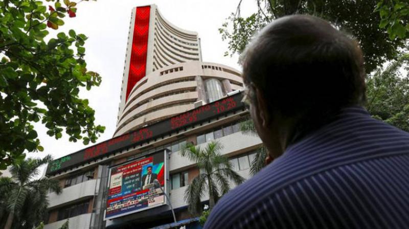 Sensex, Nifty end lower