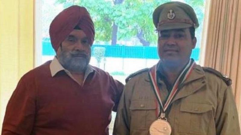 BIS Chahal felicitates ASI Jasvir for winning Silver and Bronze medals BIS Chahal felicitates ASI Jasvir for winning Silver and Bronze medals