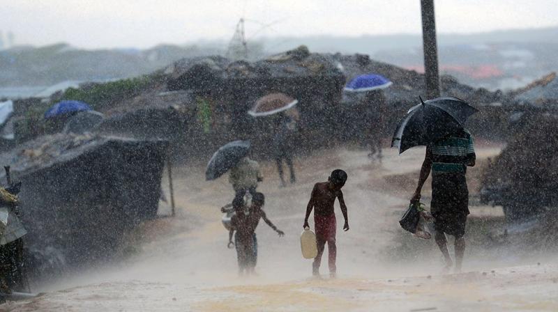 First monsoon rains pound Rohingya camps First monsoon rains pound Rohingya camps