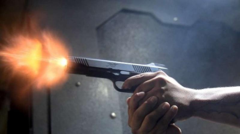Shopkeeper was shot dead by two unidentified bike-borne assailants Shopkeeper was shot dead by two unidentified bike-borne assailants
