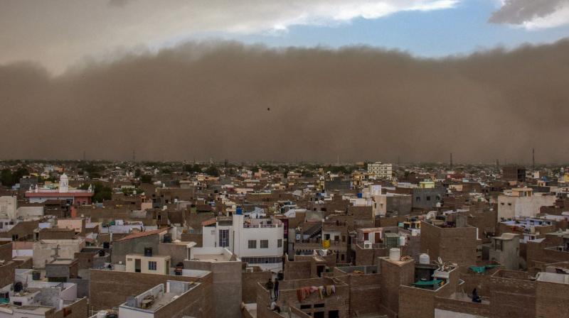 Severe dust storm followed by thunder showers