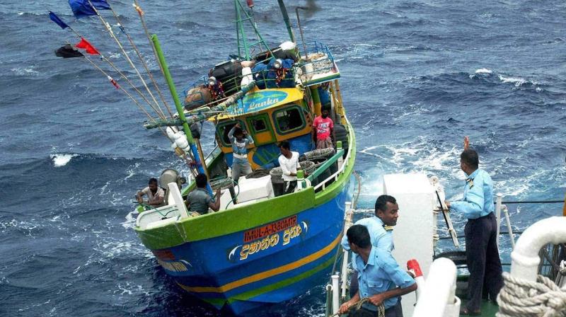 Four Tamil Nadu fishermen were arrested by the Sri Lankan Navy