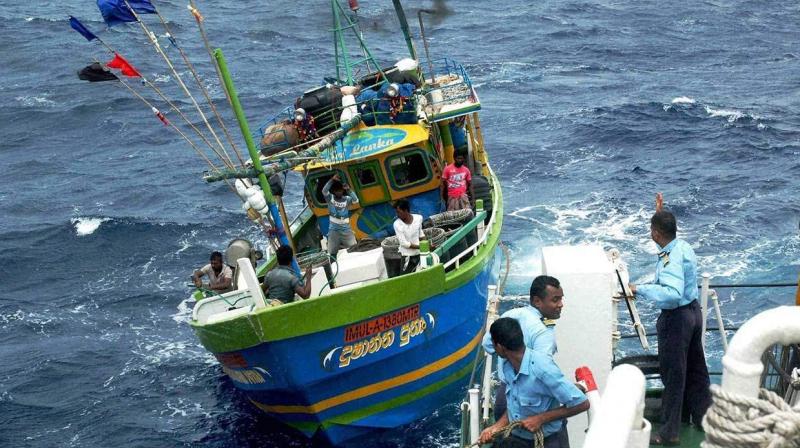 Four Tamil Nadu fishermen were arrested by the Sri Lankan Navy Four Tamil Nadu fishermen were arrested by the Sri Lankan Navy