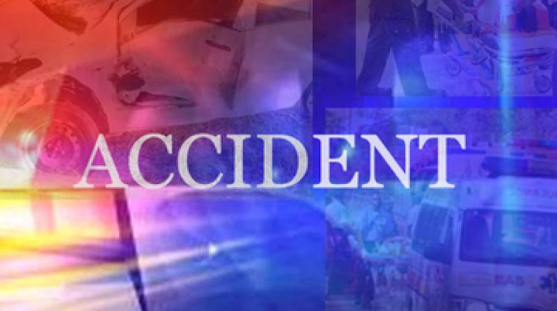 A pick-up vehicle hit a stationary truck at a petrol pump A pick-up vehicle hit a stationary truck at a petrol pump