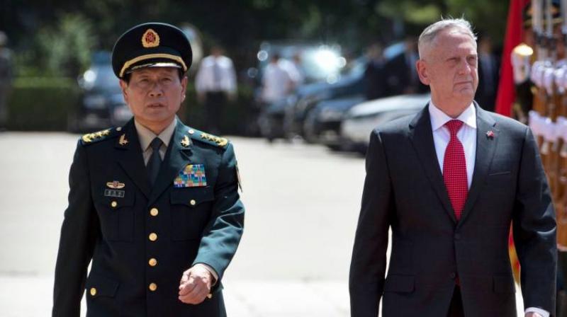 US, Chinese defence chiefs talk cooperation despite tensions US, Chinese defence chiefs talk cooperation despite tensions