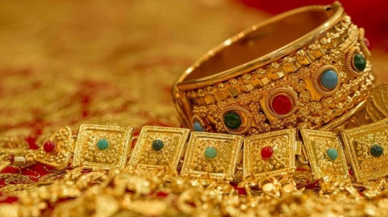 Gold slips on fall in demand Gold slips on fall in demand