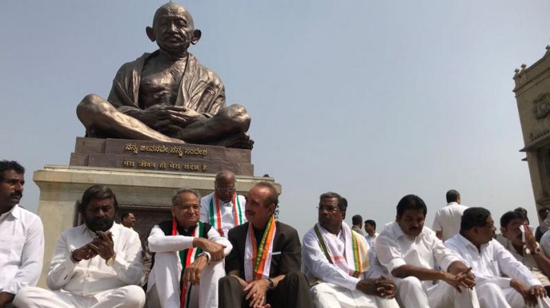 Members of the Congress, including senior leaders staged protest at Vidhan Soudha