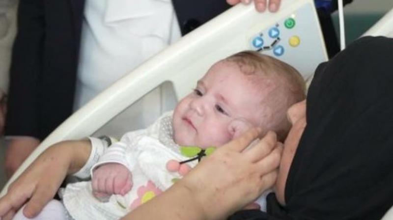 Baby Girl Rescued from Quake debris Reunited with Mother after 54 days 