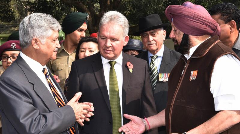 Punjab Chief Minister Captain Amarinder Singh interacting with British Deputy High Commissioner Andrew Ayre and Former Army Chief General V P Malik