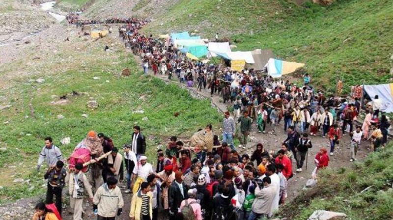 4,956 pilgrims today left the base camp here for the holy cave shrine of Amarnath