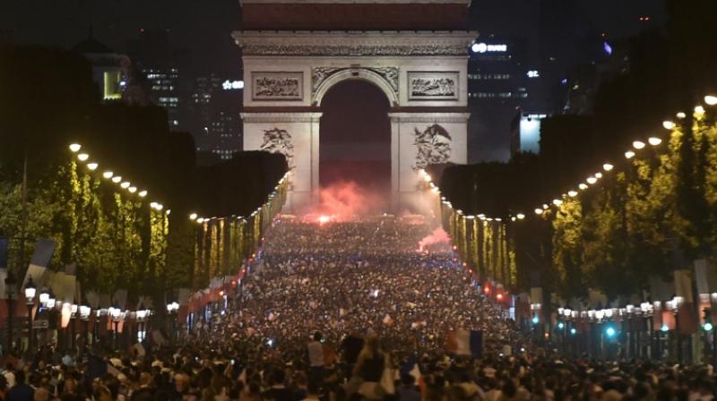 Paris celebrates France's march