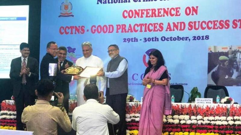DGP IT&T, V.K. Bhawra receiving (CCTNS) good practice award