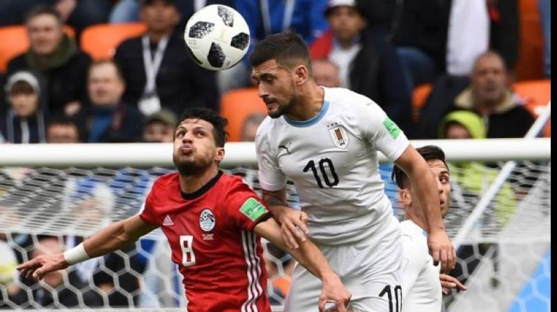 Uruguay strike late to beat Egypt as Salah sits out match Uruguay strike late to beat Egypt as Salah sits out match