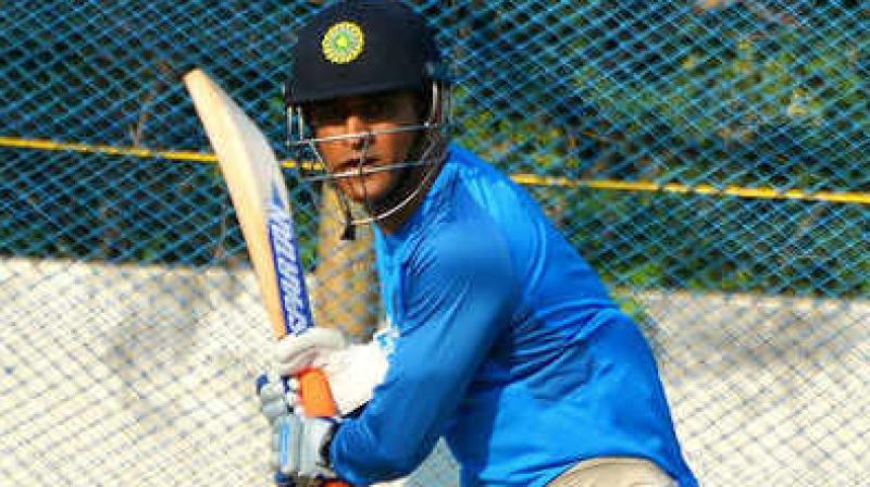 Far from madding crowd, Dhoni trains alone at NCA Far from madding crowd, Dhoni trains alone at NCA