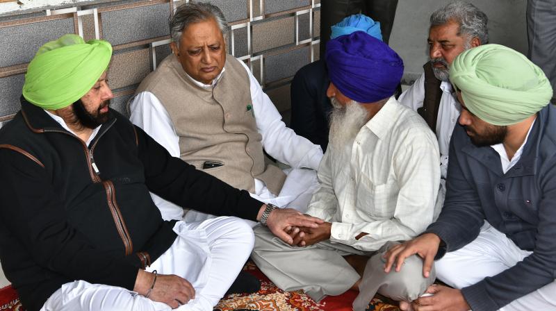 Captain Amarinder Singh sharing condolences with Darshan Singh, the father of Martyr Kulwinder Singh