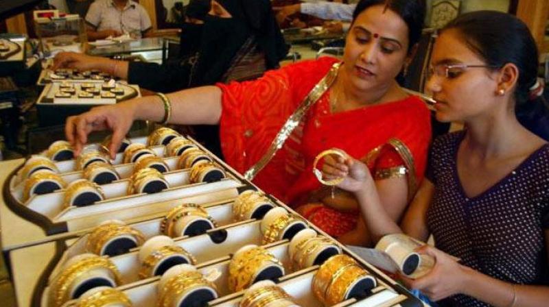 Gold prices recovered by Rs 25 to Rs 30,825 per 10 grams Gold prices recovered by Rs 25 to Rs 30,825 per 10 grams