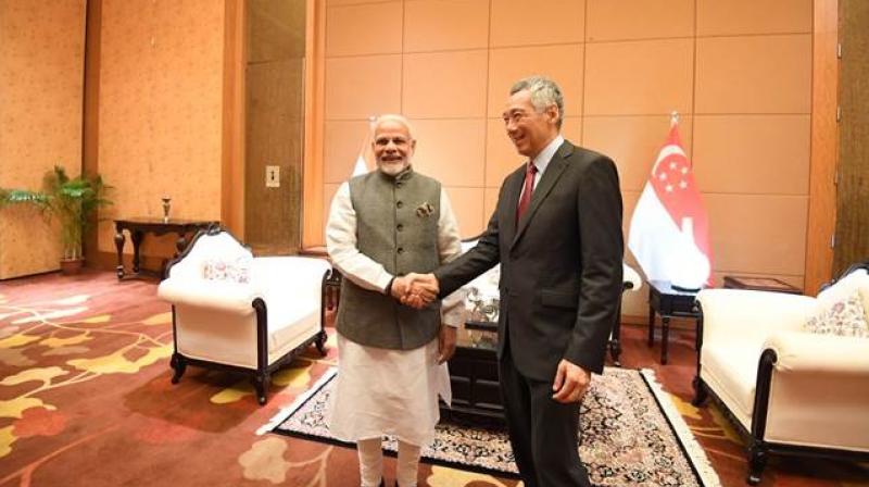 Narendra Modi today met his Singaporean counterpart Lee Hsien Loong Narendra Modi today met his Singaporean counterpart Lee Hsien Loong
