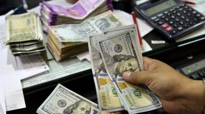 Rupee slides 7 paise against US dollar Rupee slides 7 paise against US dollar