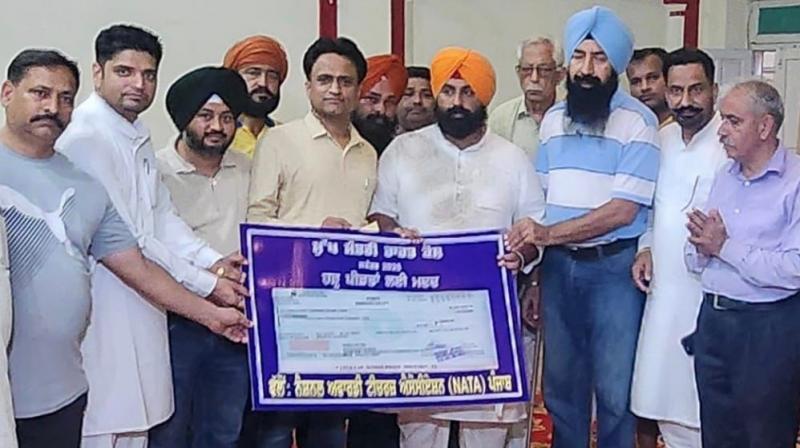 Punjab: National Awardee Teachers donate Rs. 1.25 lakh for flood relief on Teachers' Day Punjab: National Awardee Teachers donate Rs. 1.25 lakh for flood relief on Teachers' Day