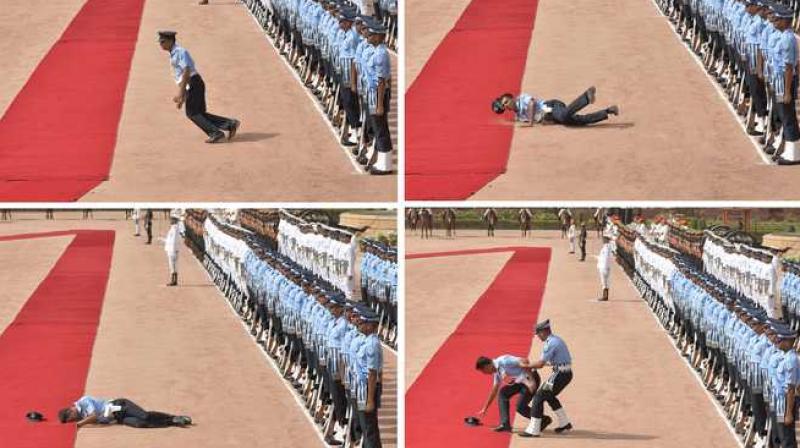 A member of the IAF, on Guard of Honour duty, faints during the ceremonial A member of the IAF, on Guard of Honour duty, faints during the ceremonial