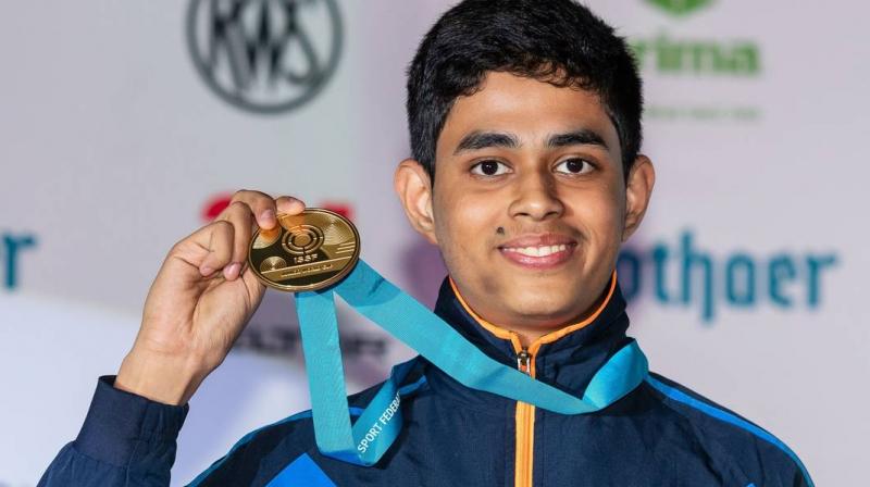 Hriday Hazarika after winning the Junior men's air rifle gold