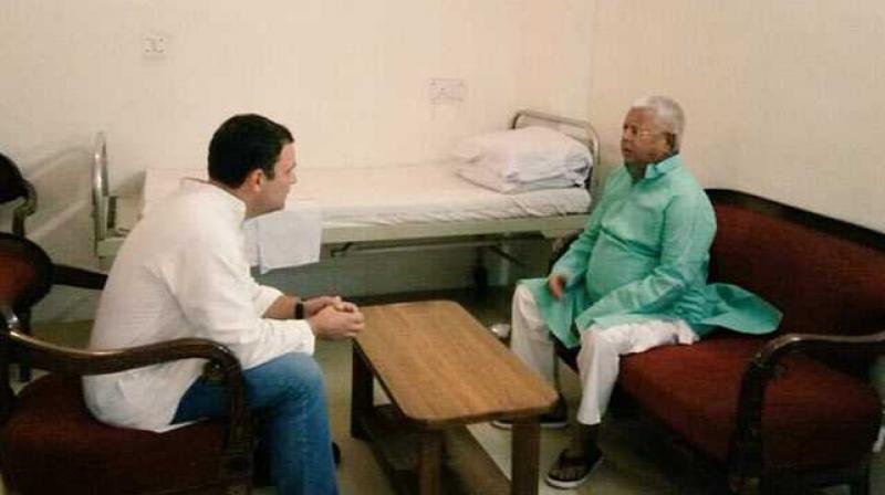 Rahul Gandhi meets Lalu at AIIMS Rahul Gandhi meets Lalu at AIIMS