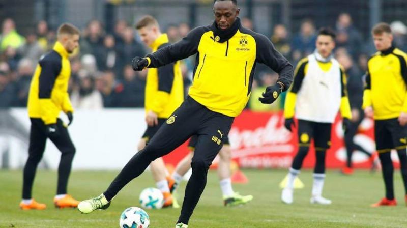 Bolt poised for surprise Football club Bolt poised for surprise Football club