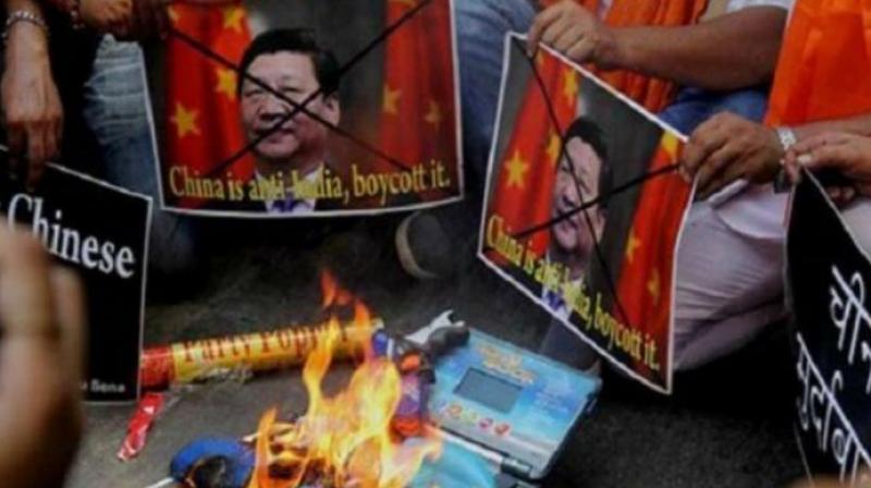 Traders burn Chinese goods a day before 'Holika-dahan'