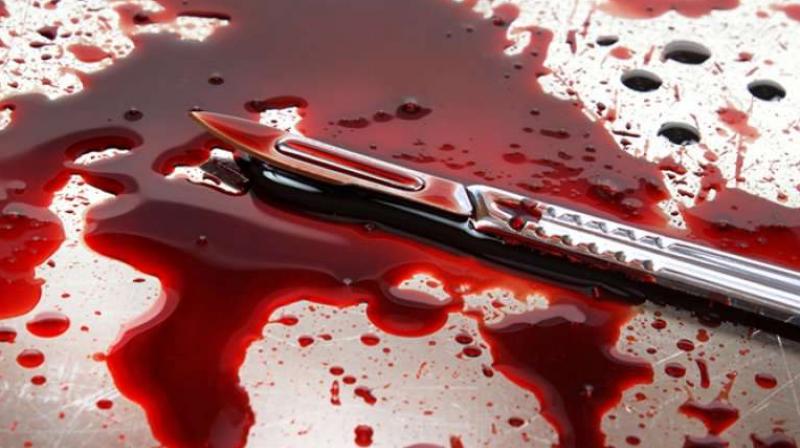 26-year-old man's throat was allegedly slit by two men 26-year-old man's throat was allegedly slit by two men