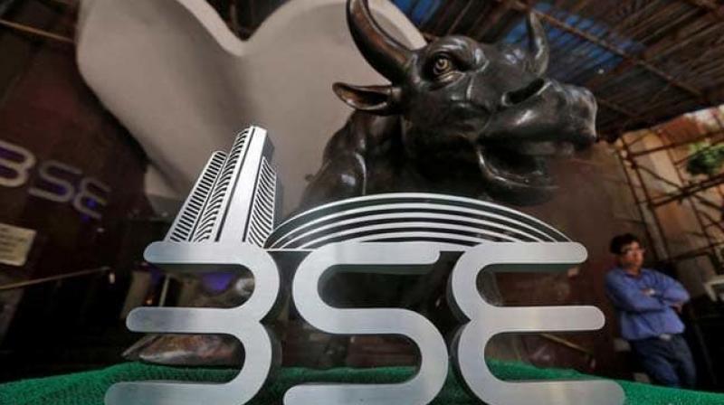 Benchmark Sensex slipped from life highs to fall over 100 points