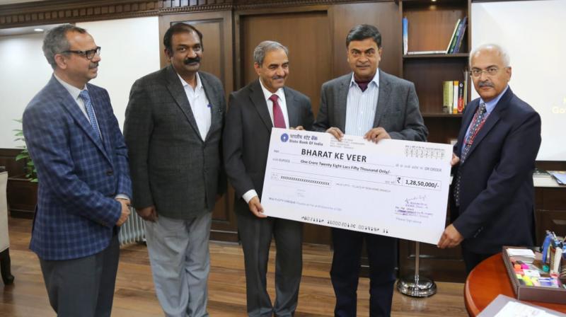 D. K. Sharma, Chairman, BBMB presenting a cheque to Raj Kumar Singh, Hon'ble Minister of State for Power
